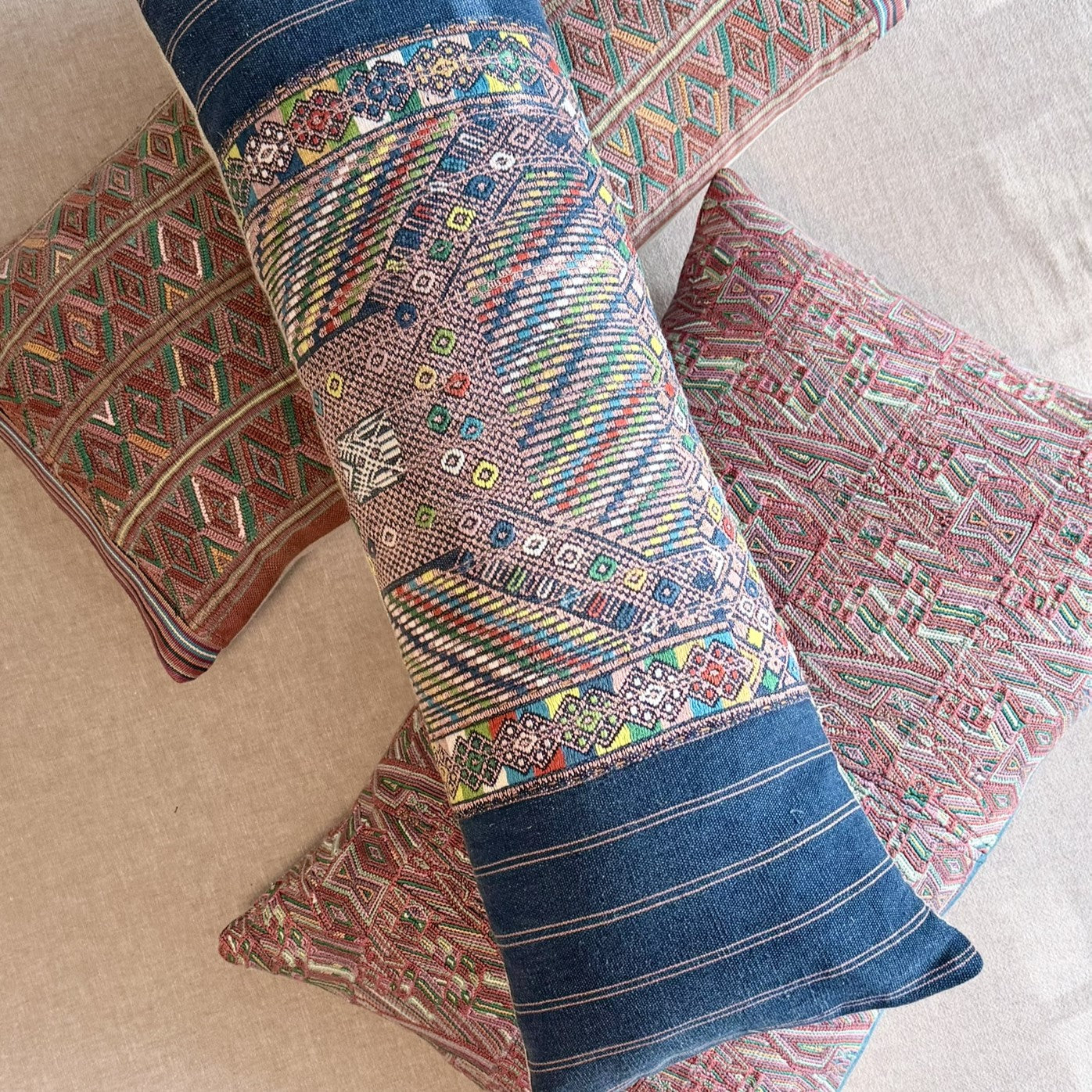 Intertwined handmade throw pillows provide the perfect accent for your sofa or bed.