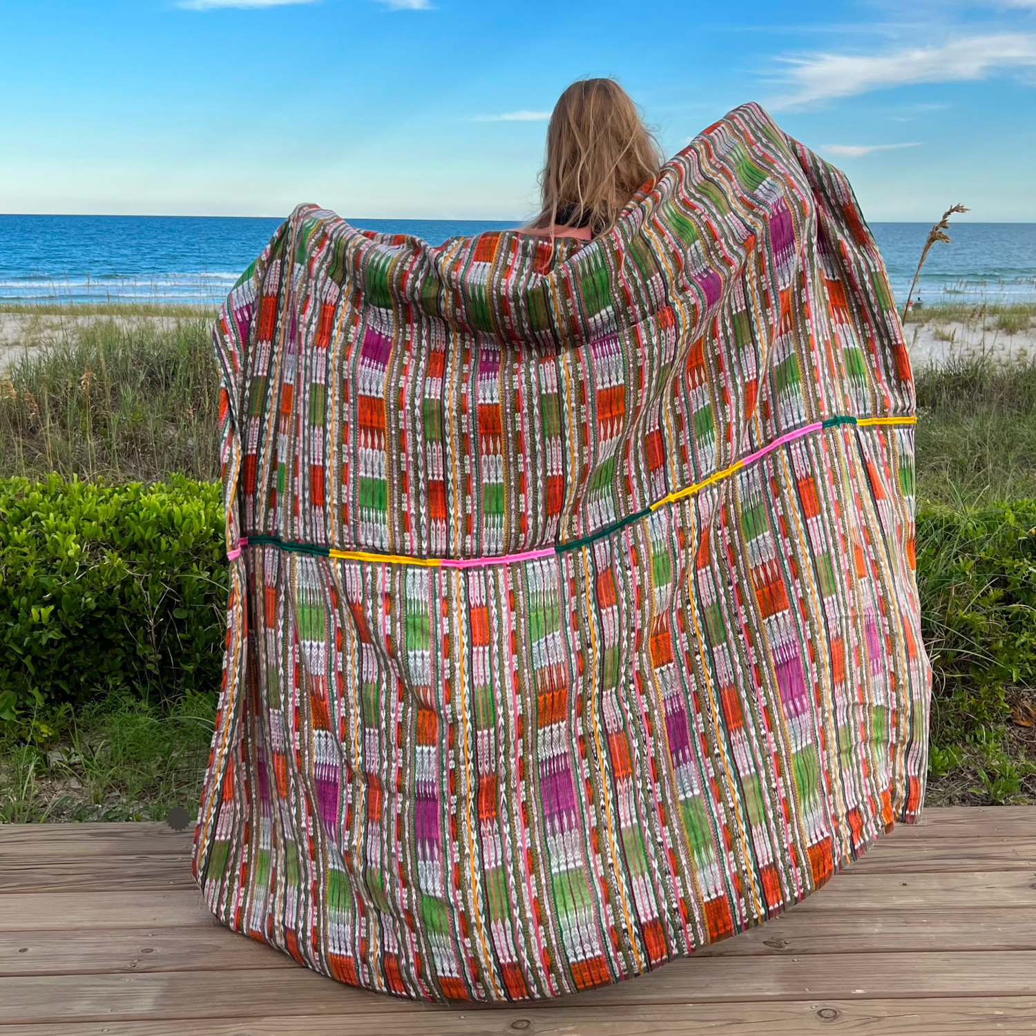 Intertwined's handwoven blankets are colorful and versatile: use as a throw for your sofa or bed, as a picnic blanket, beach blanket, or even a tablecloth.