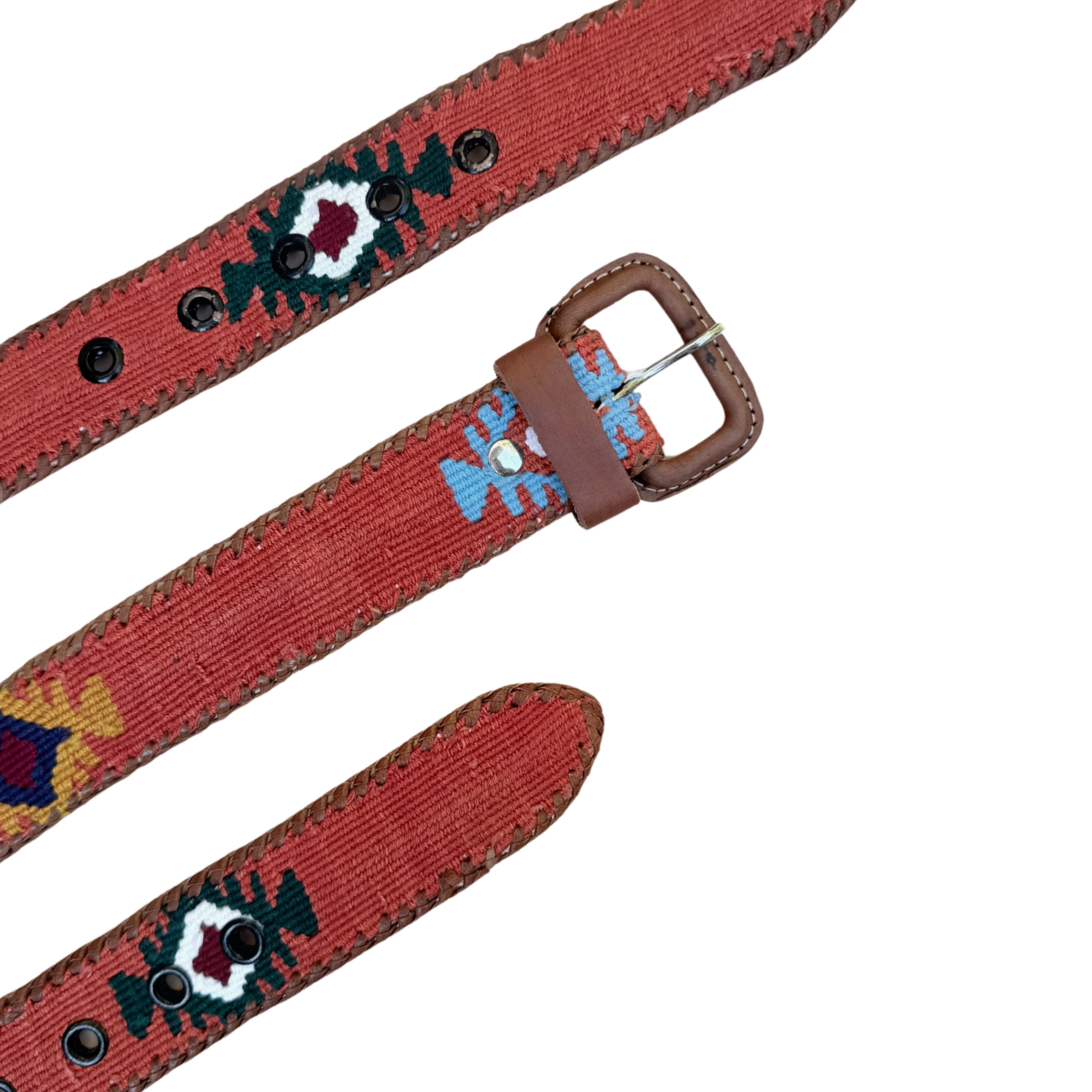 Orange belt with colorful embroidered design and brown leather buckle on a white background