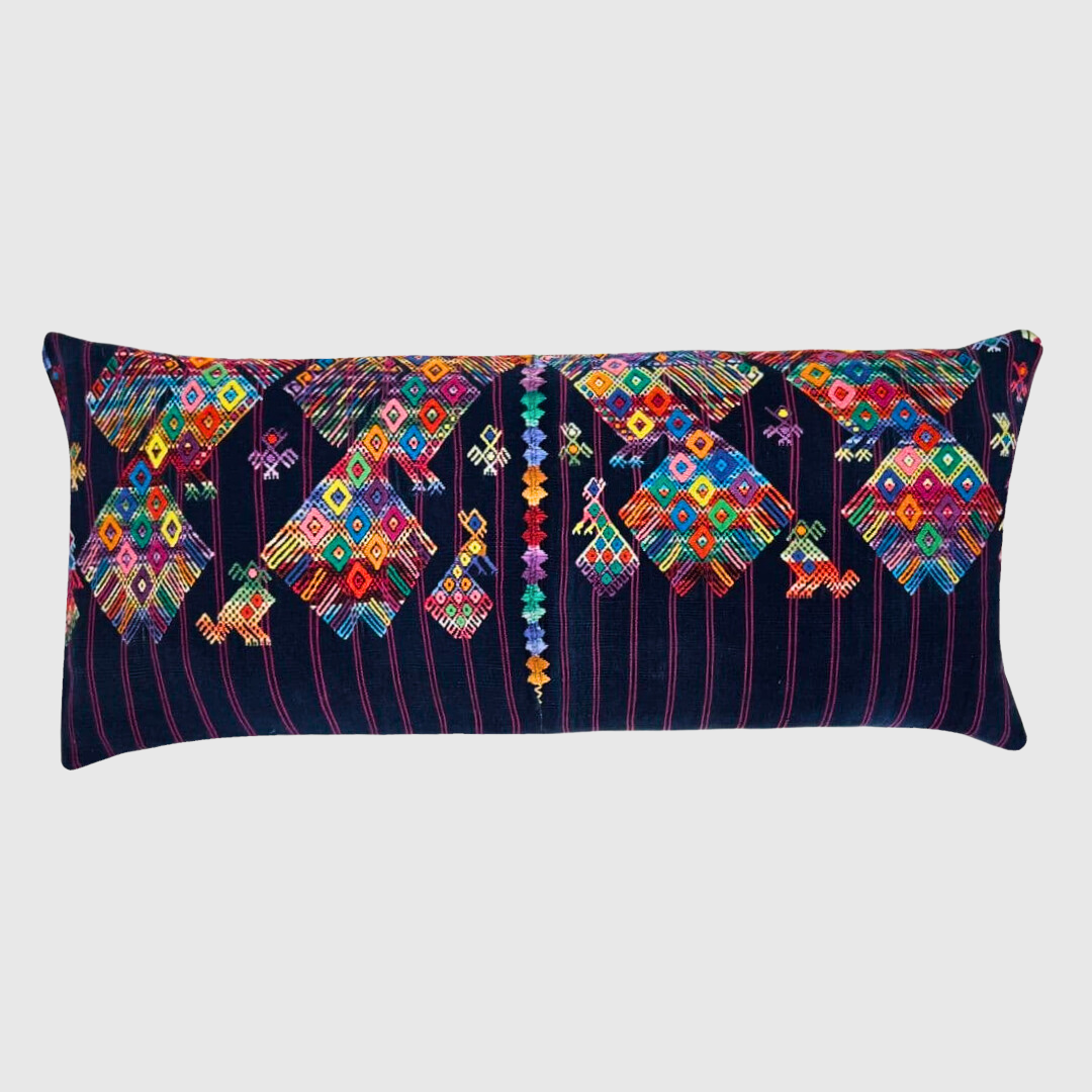 Indigo Multicolor Huipil and Hemp Lumbar Pillow on a light gray background - Intertwined: Handmade for Good