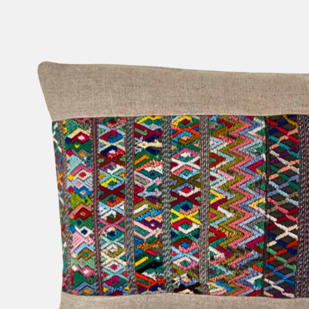 Close up of a Multicolor Huipil and Hemp pillow on a light gray background - Intertwined: Handmade for Good