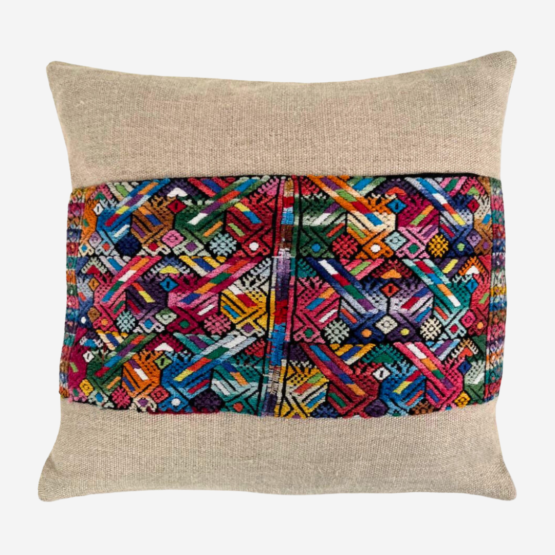 Multicolor huipil and hemp pillow on light gray background - Intertwined: Handmade for Good