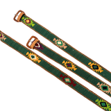 Green belt with decorative patterns and brown buckle on a white background