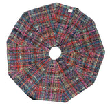 A circular fabric tree skirt with a multicolor plaid and tweed pattern, laid flat on a white background.