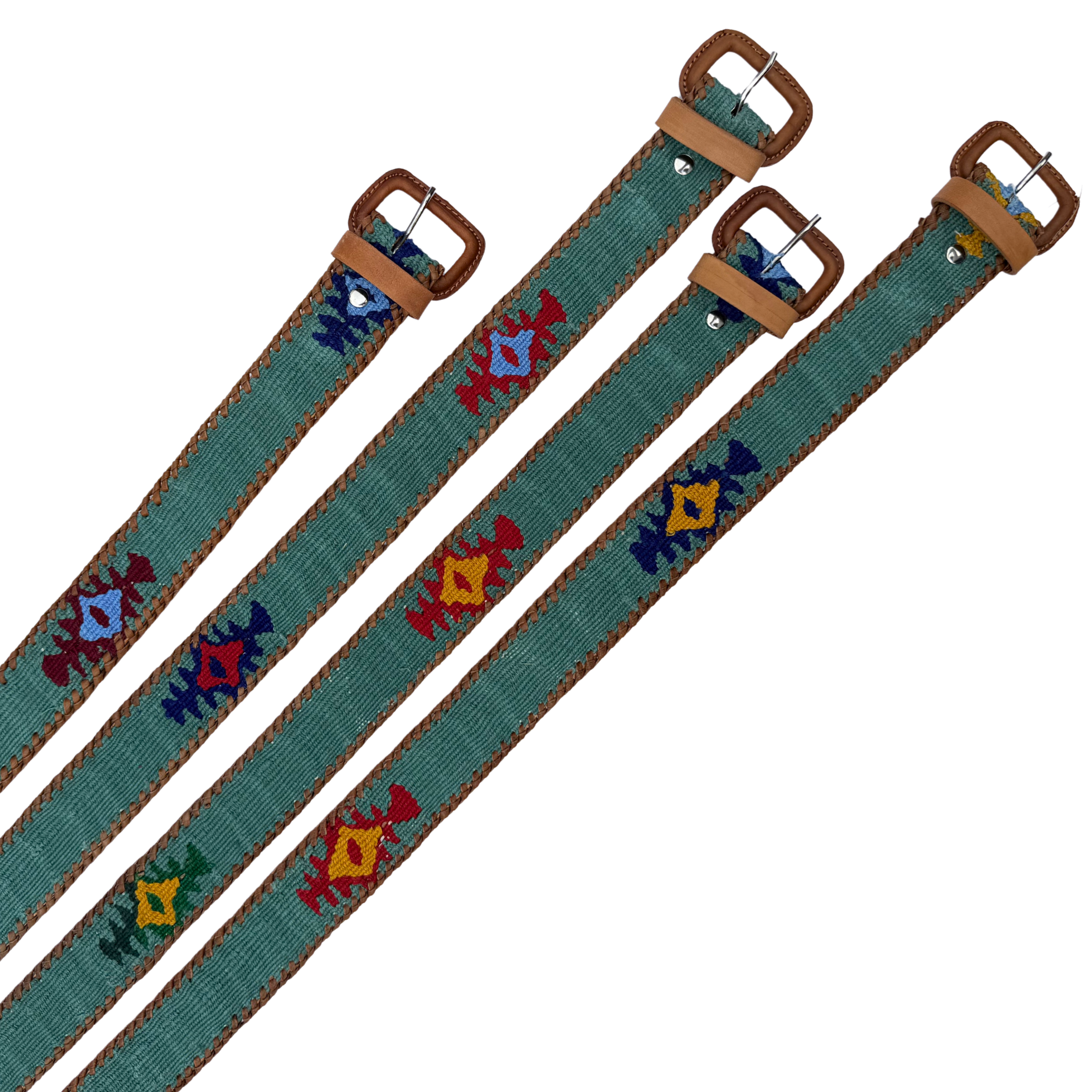 Three teal belts with embroidered patterns and brown buckles on a white background