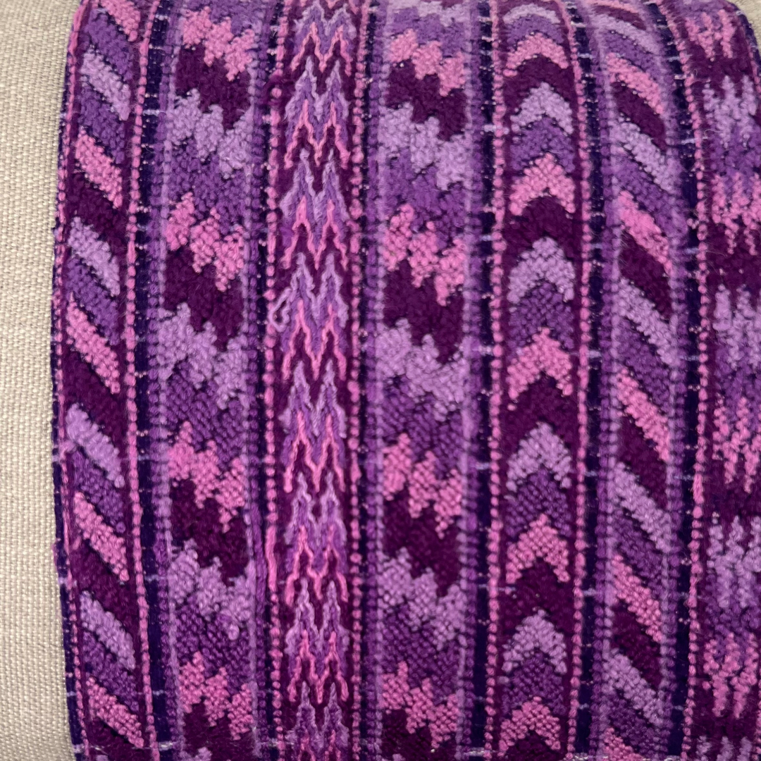 Close up of Hemp lumbar pillow with purple huipil stripe section down middle - Intertwined: Handmade for Good